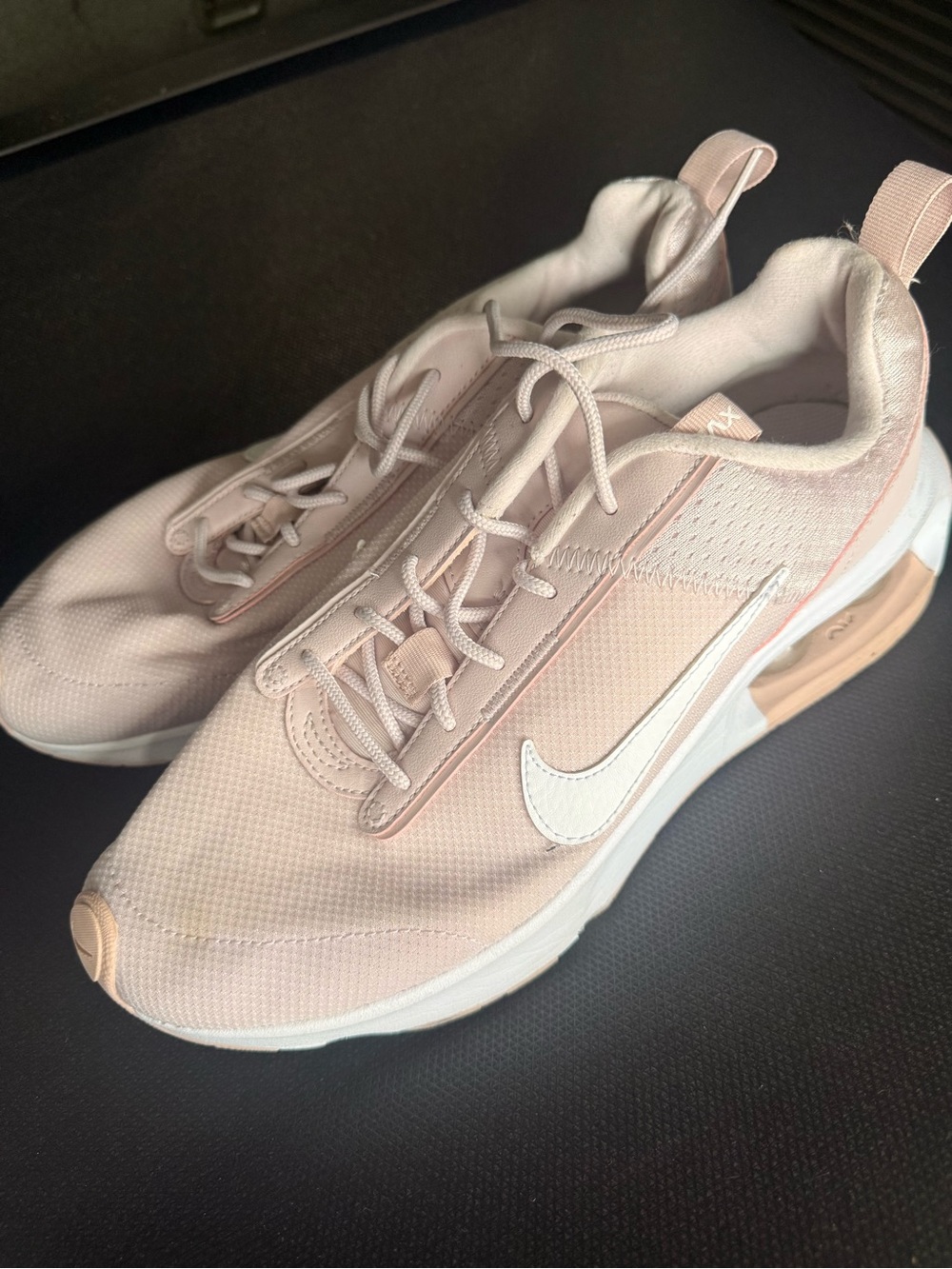 Nike Women's Light Pink Mesh Athletic Sneakers with White Swoosh
